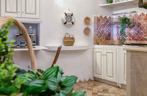 Capo d'Orso Apartment | Lovely apartment for 2 guests with A/C, TV and pets allowed