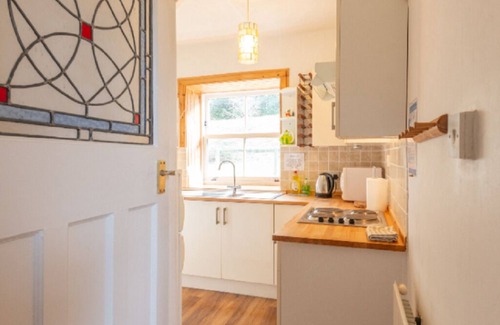 Inverfarigaig Cottage | Lovely foresters cottage, amazing Loch Ness views, private beach, pets welcome