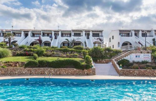 Arenal d'en Castell Apartment | Lovely hideaway with pool and white sand beach