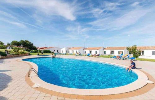 Arenal d'en Castell Apartment | Lovely hideaway with pool and white sand beach