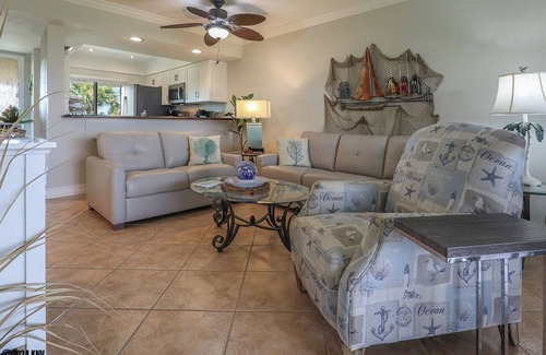 Mid Island Condo | LOVELY WATERFRONT BAY VILLAGE 2B/2B CONDO! WALK TO BEACH!