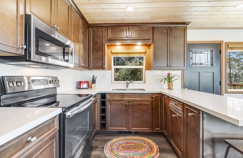 Gualala Cottage | Lower-level cottage with ocean views, fireplace, furnished deck, & internet