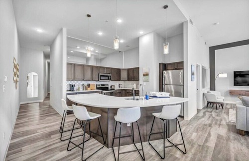 Gateway District Apartment | Luxe Flat with Heated Pool, Sauna, Rooftop Deck, Gym