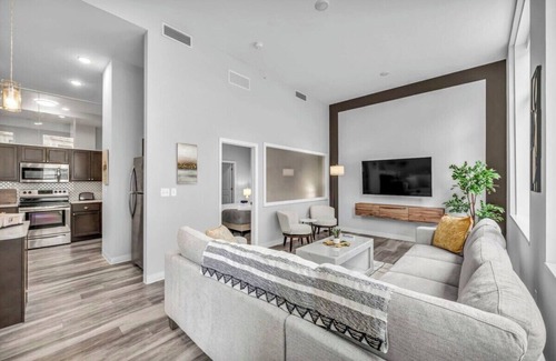 Gateway District Apartment | Luxe Flat with Heated Pool, Sauna, Rooftop Deck, Gym