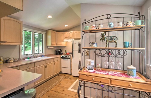 Weare Cottage | Luxe Riverfront Cottage w/Dock by Lake Horace!