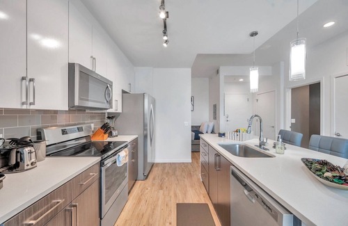 Channel District Apartment | Luxury 1 BR with Den Downtown Tampa Apt: City Views, Rooftop Pool, Workspace