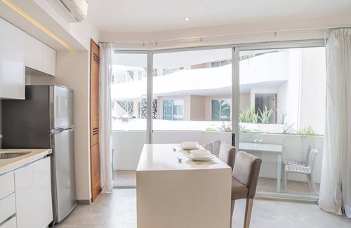 12th Street Apartment | Luxury 1BR with Stunning Poolside Terrace