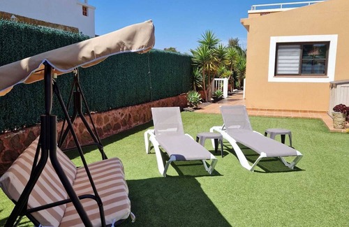 Caleta de Fuste Villa | Luxury 3 bedroom villa overlooking golf course with private pool and Wi-fi