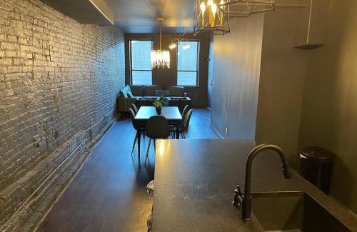 West Main Historic District House | Luxury City Escape & Peaceful Retreat by Hollyhock