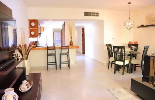 Playacar Condo | Luxury Condo Close to the beach,Tropical Setting,Garden Patio, Golf Club Nearby