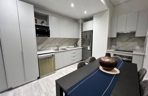 Menlyn Apartment | Luxury continental apartments (2 units) in a lifestyle block with concierge.