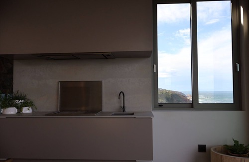 George House | Luxury house in Herolds Bay. Stunning ocean views. Hiking, cycling and golf.