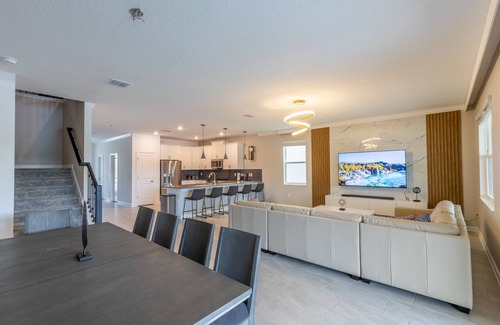 Kissimmee House | Luxury Lakeview Villa with Game Room + Theater & Free Waterpark Close to Disney