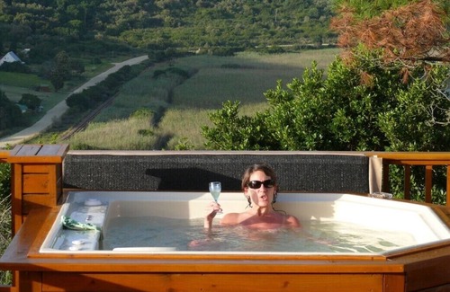 Wilderness House | Luxury log home with lake and mountain views, close to world-class golf courses