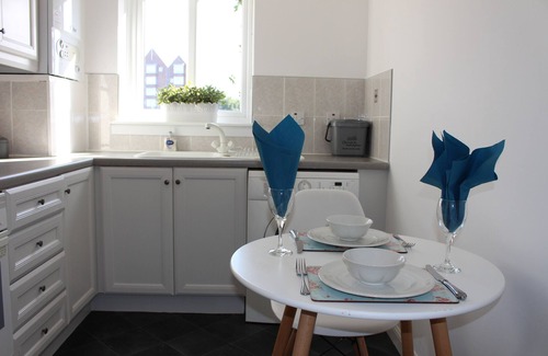 Ayr Apartment | Luxury Riverside Retreat with Sunny Balcony