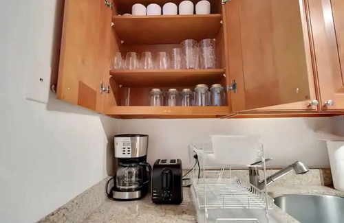 Bayshore Gardens Apartment | Luxury steps from Bayshore! Pool-Gym-FREE parking