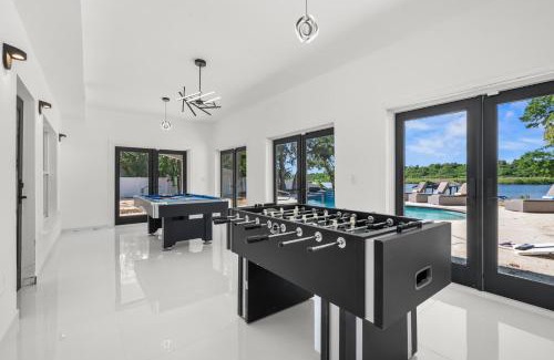 Clair-Mel City House | Luxury Waterfront Villa Heated Pool & Gameroom