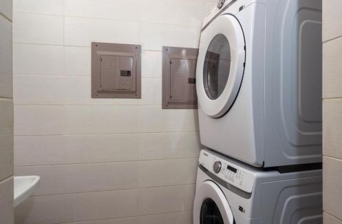 Rousseau Apartment | Mahogany Suites by Skyreach Group