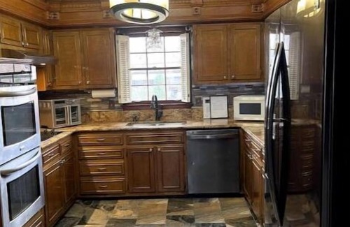 Whitehaven House | Maxie's retreat: Enjoy this charming house w/modern updates & timeless appeal.