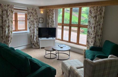 Fiddington Cottage | MILL POND COTTAGE, pet friendly, with a garden in Williton