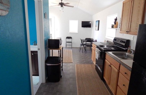 Matagorda Cabin | Mini resort with peaceful property includes pool and fun. Fishin Mission !