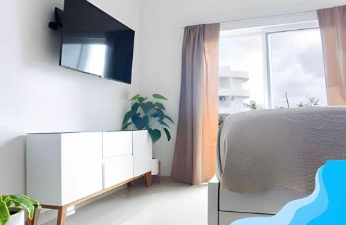 Punta Sam Apartment | Minimalist Studio with Pool and FREE Scooter