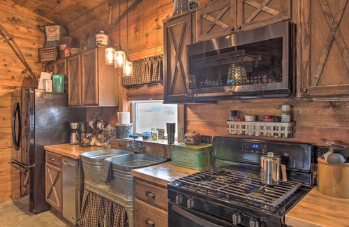 Dawn Cabin | Missouri Vacation Rental with Fire Pit Access