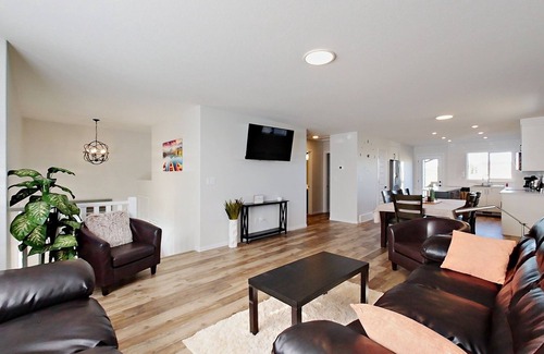 Red Deer House | Modern 4 Bedroom House for 8 Guests in Red Deer ~ Games Room, Fire Pit, A/C, BBQ