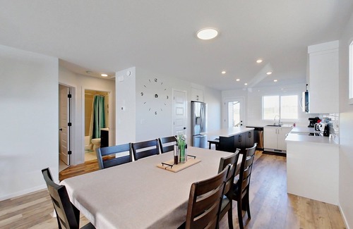 Red Deer House | Modern 4 Bedroom House for 8 Guests in Red Deer ~ Games Room, Fire Pit, A/C, BBQ