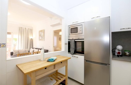 Estepona Apartment | Modern and bright apartment with communal pool, Estepona port near restaurants, bars and beaches