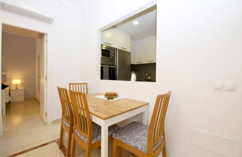 Estepona Apartment | Modern and bright apartment with communal pool, Estepona port near restaurants, bars and beaches