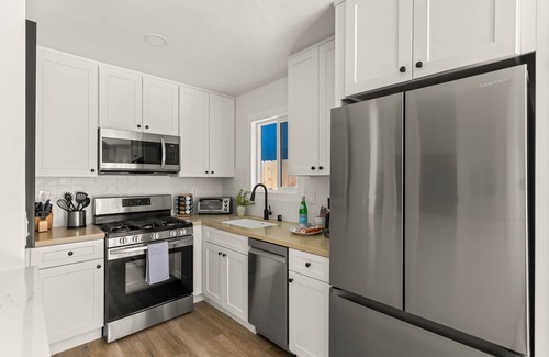 Crown Point House | Modern and Cozy in PB with Patio and Firepit