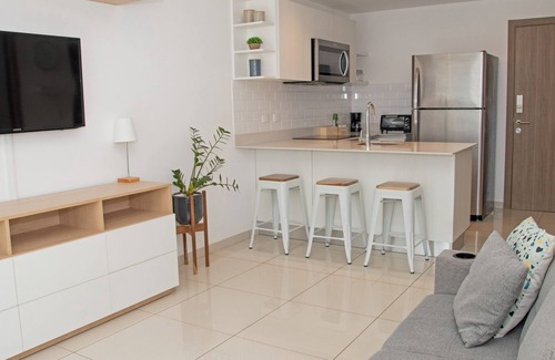 Cinco Esquinas Apartment | Modern apartment in condominium with pool