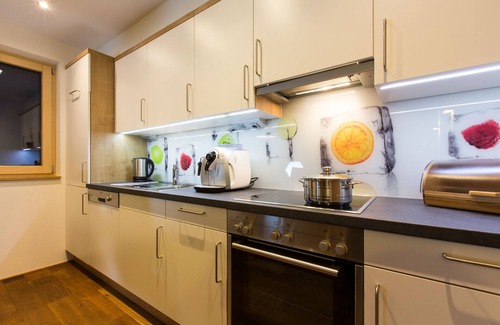 Mellau Apartment | Modern apartment with all the trimmings: sauna, carport, ski room etc.