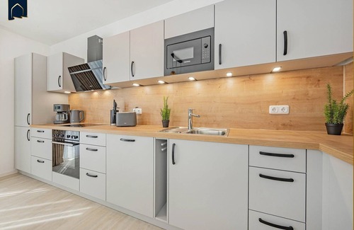 Koelpinsee Apartment | Modern apartment with balcony - close to the beach and family-friendly