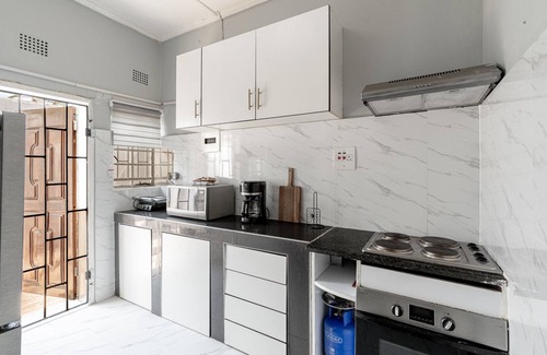 Lusaka Apartment | Modern Apt near Best Malls Restaurants &Stores