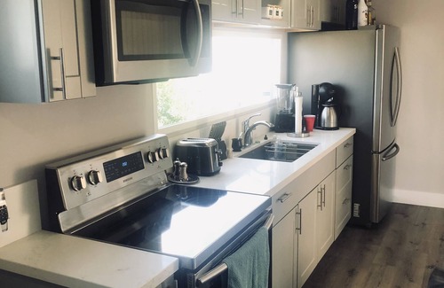 Las Vegas Cabin | Modern container home in Las Vegas with own soccer field and trees.