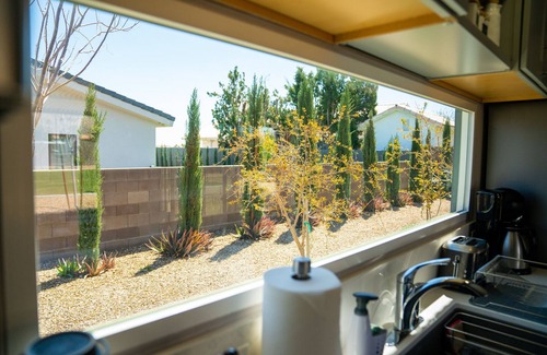 Las Vegas Cabin | Modern container home in Las Vegas with own soccer field and trees.