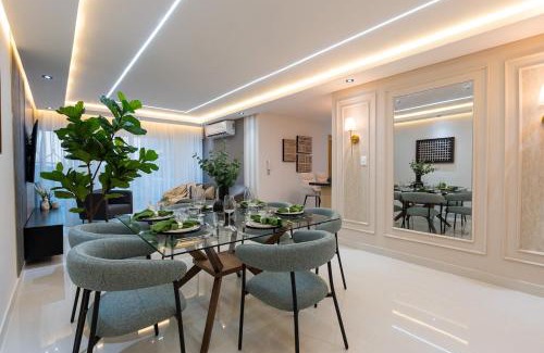 Punal Apartment | Modern 3BR! 9FL, King Bed! STI with Pool! Fast wifi!