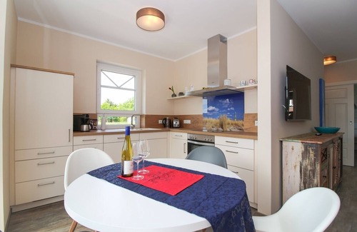 Norden Apartment | Modern first floor apartment with sauna and beach chair in the garden for 4 persons