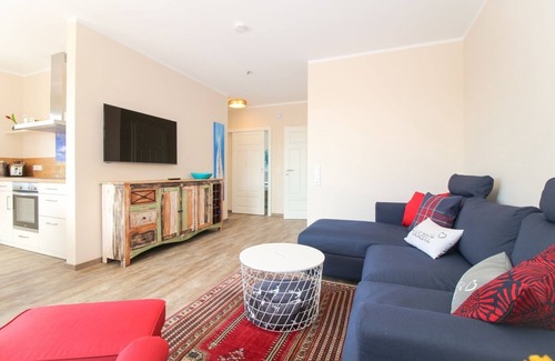 Norden Apartment | Modern first floor apartment with sauna and beach chair in the garden for 4 persons