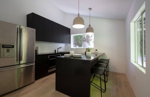 Occidental House | Modern home with a creek