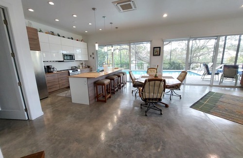 Palm Harbor House | Modern Jewel, 10 Min. drive to Honeymoon Island, Sleeps 4, Lap Pool, WorkoutRoom