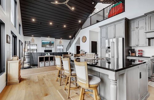 Spicer House | Modern Lake Home with game room and large patio in Spicer