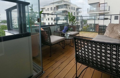 Moss Municipality Condo | Modern Scandinavian apartment with two balconies, roof top terrace and parking.