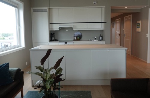 Moss Municipality Condo | Modern Scandinavian apartment with two balconies, roof top terrace and parking.
