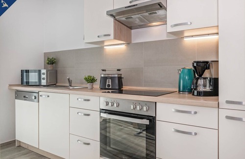 Loddin Apartment | Modern vacation apartment in Loddin with sauna & large garden near the Baltic Sea & lake