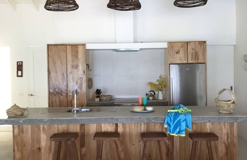 Moso Island House | Moso Island Luxury Retreat is a private house right on the beach.