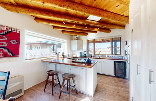 Taos House | Mountain-view estate with casita, POP tennis, rooftop bar & private hot tub