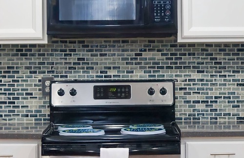 Northeast Kansas City House | nCozy 3-bedroom home in Kansas City with WiFi, AC, and a private backyard.